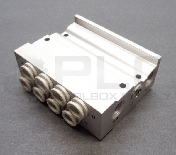 NEW SMC SS5Y-41-04-C8 BASE MOUNT MANIFOLD w/8 - 5/16" PUSH CONNECT PORTS *READ*